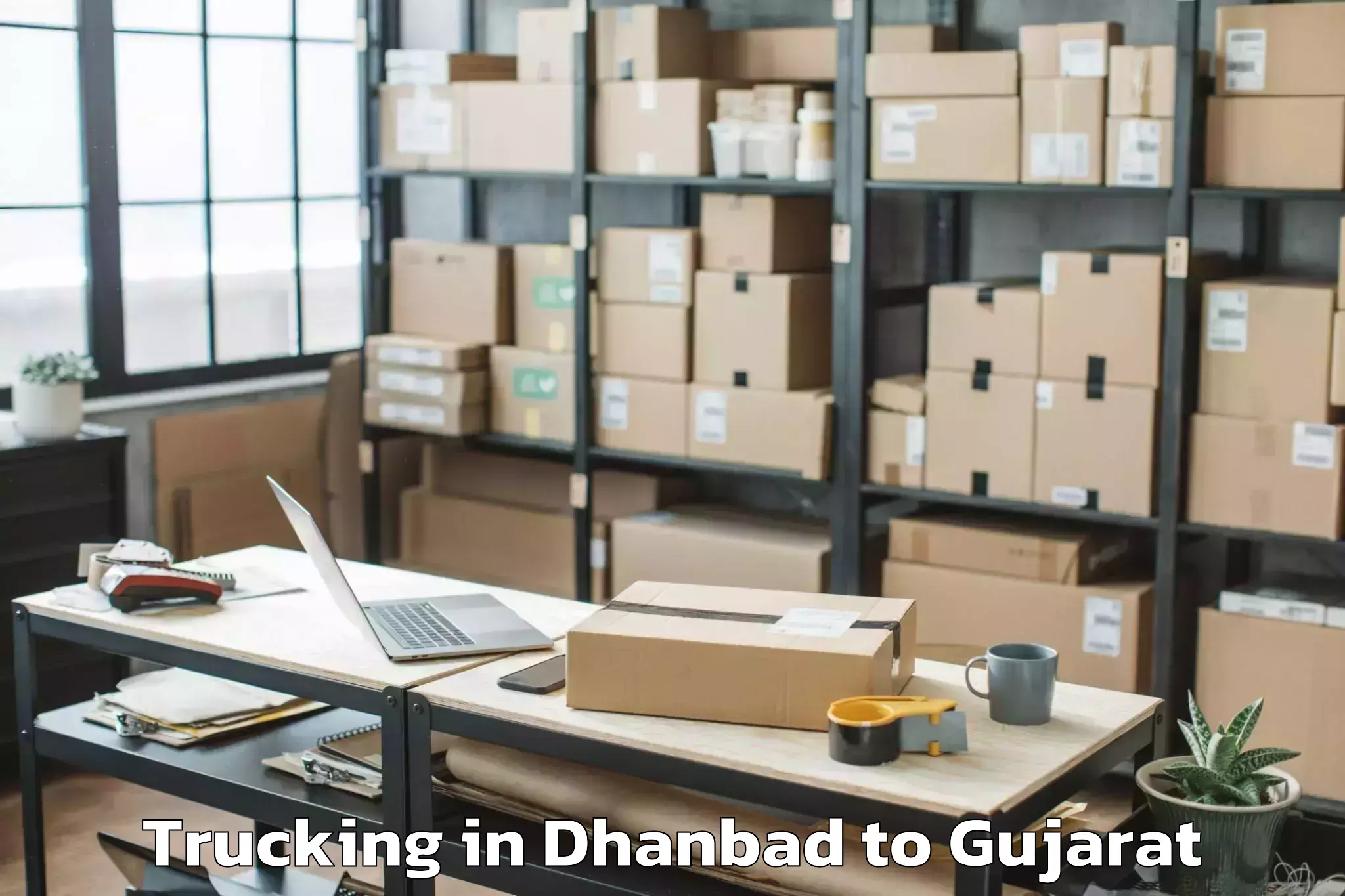 Get Dhanbad to Rajula Trucking